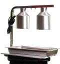 A stainless steel tray is sitting under a heat lamp.