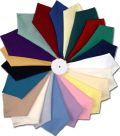There are many different colored napkins in a circle.