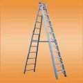 A ladder is sitting on top of an orange surface.
