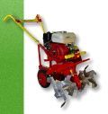 A red lawn mower is sitting on top of a green and white lawn.
