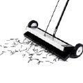 A black and white photo of a magnetic sweeper.