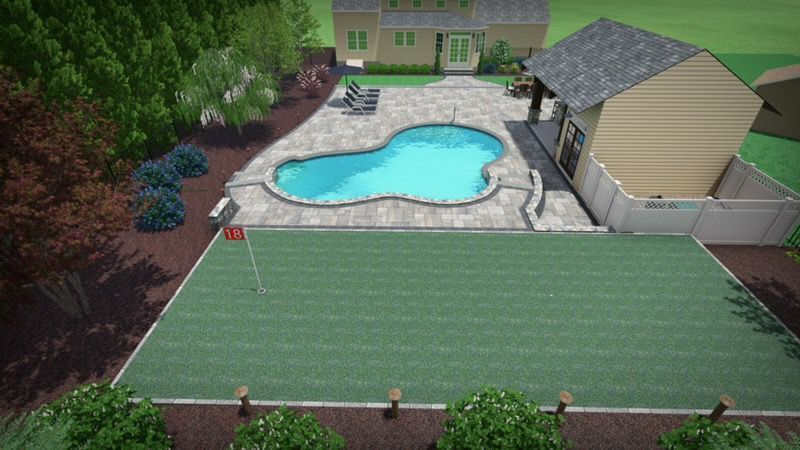 Backyard with a swimming pool and large green fenced lawn beside a house