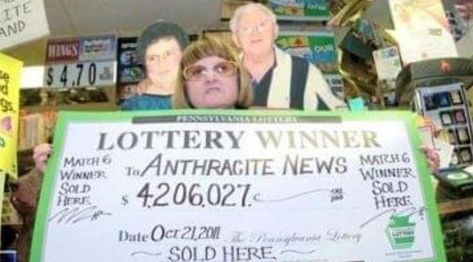 A lottery winner's check is displayed in a store.