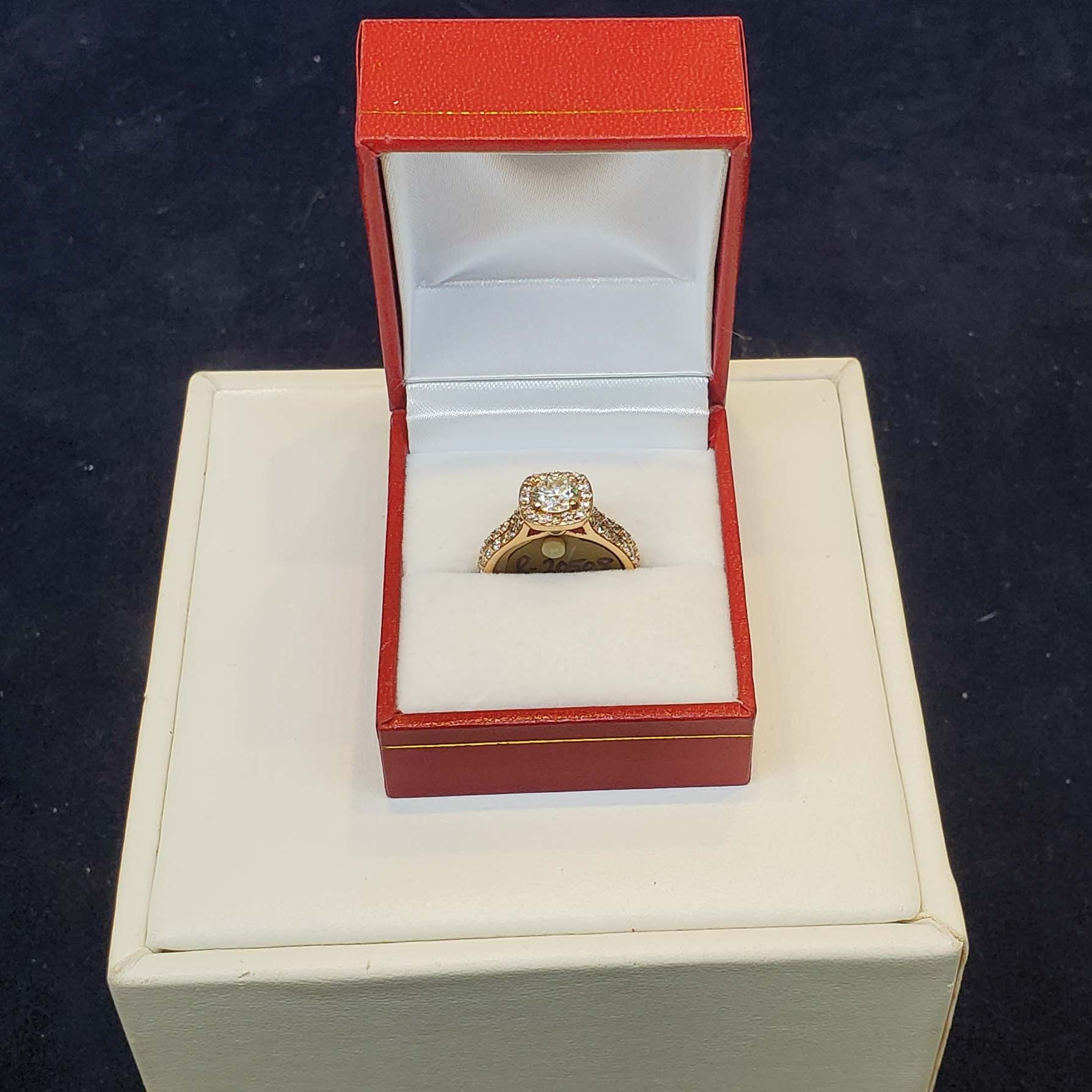 A ring in a red box on top of a white box