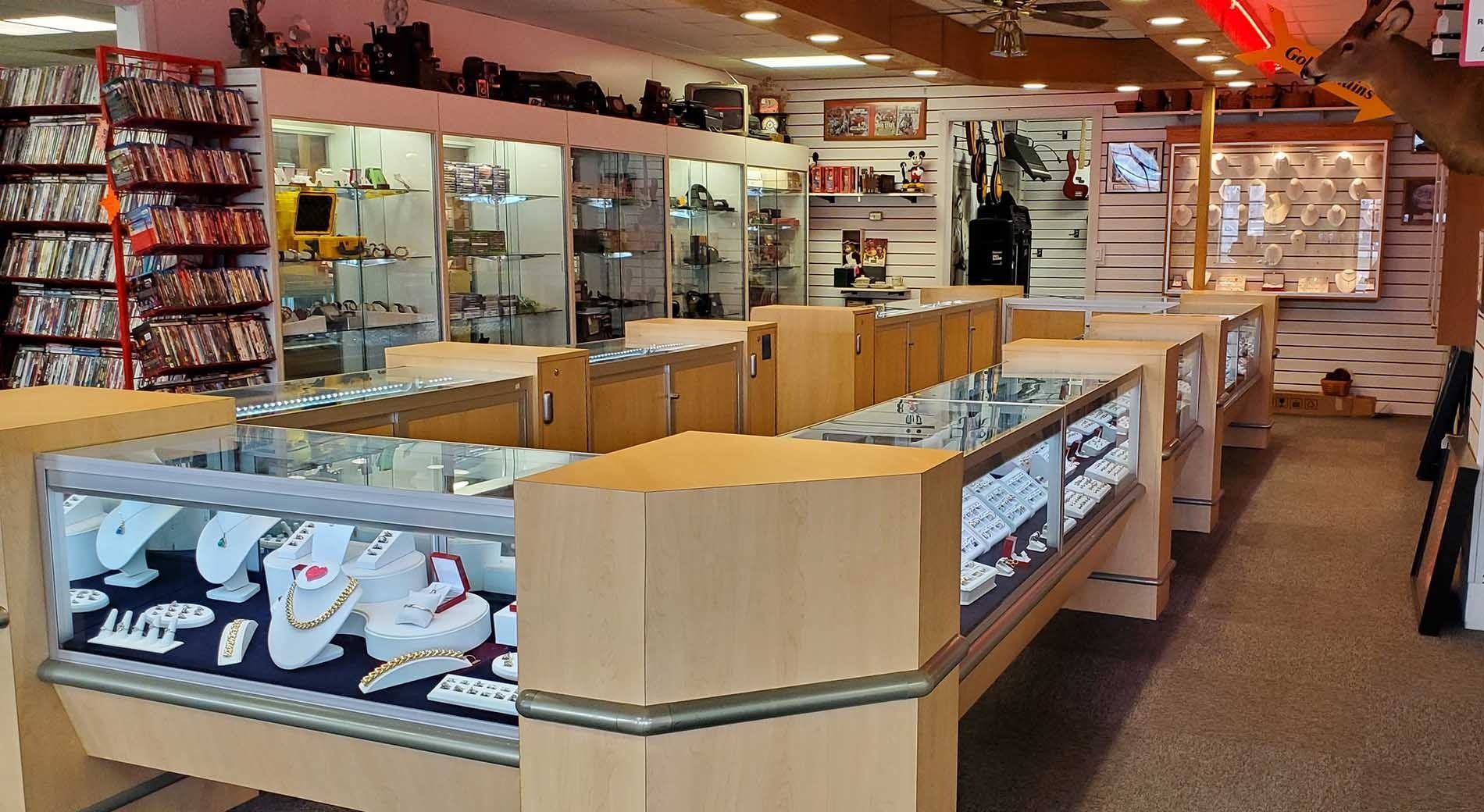 A jewelry store filled with lots of display cases