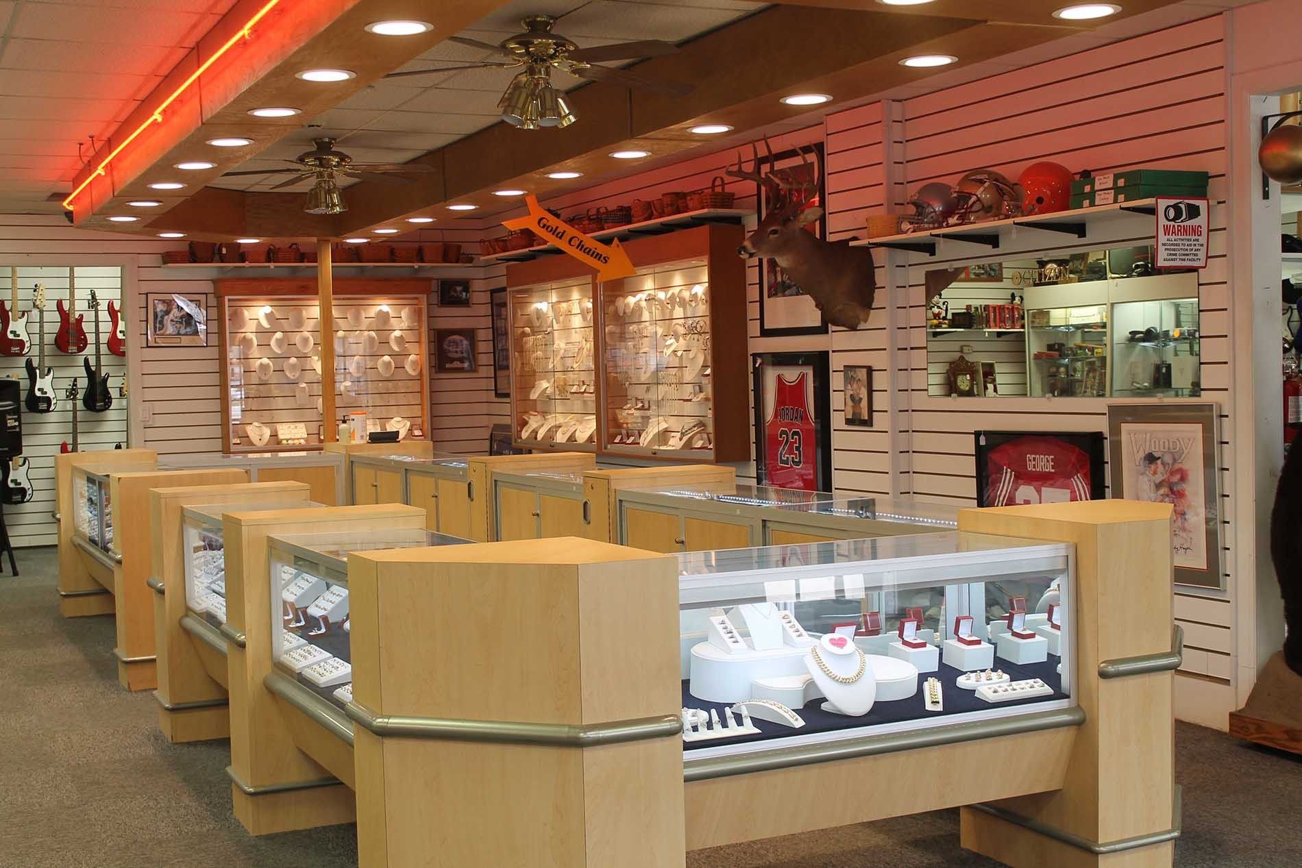 The inside of a jewelry store with many display cases