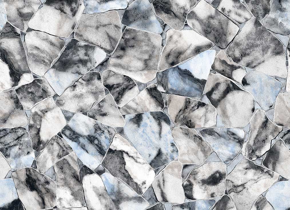 Mosaic of irregularly-shaped marble tiles in shades of gray, white, and blue.