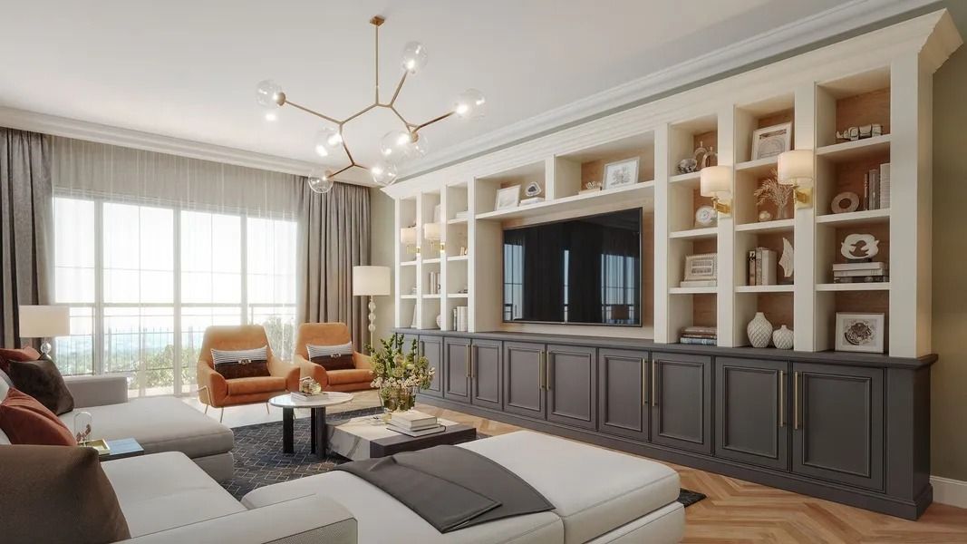 Living room with built-in bookcase, TV, couch, and two armchairs. Neutral color scheme.