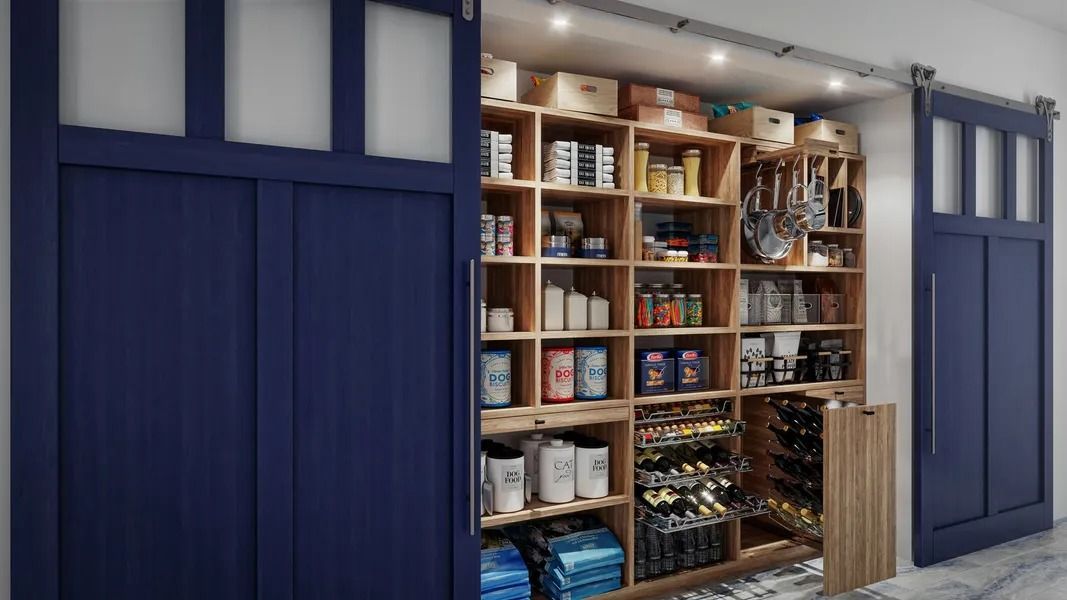 Blue pantry doors open to reveal a fully stocked pantry with wooden shelves and supplies.