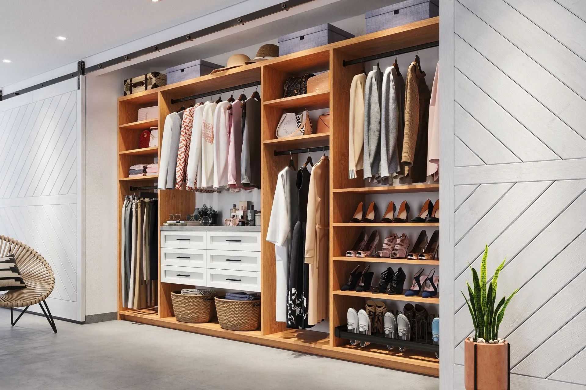 Custom wood closet with hanging clothes, shoe shelves, and drawers.