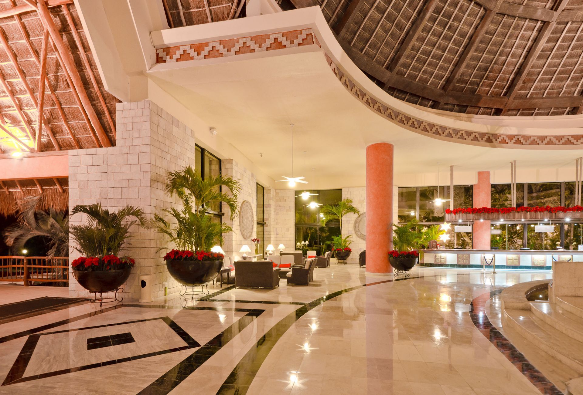 A living room filled with furniture and a balcony