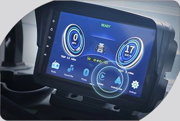 A close up of a car dashboard with a blue screen