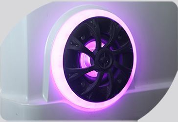 A close up of an illuminated speakers