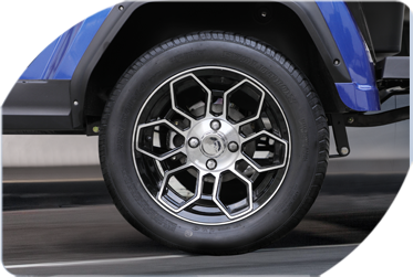 A close-up of a golf cart tire.