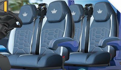The seats are blue and white and have crowns on them.