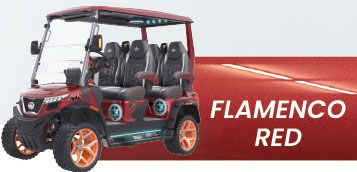 A red golf cart is parked on a red road.