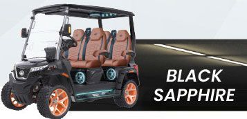 A black sapphire golf cart is parked on the side of a road.