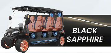 A black sapphire golf cart is parked on the side of a road.