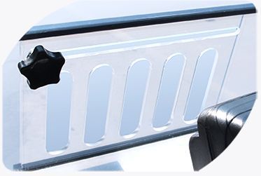 A close-up of a windshield protector on a golf cart.