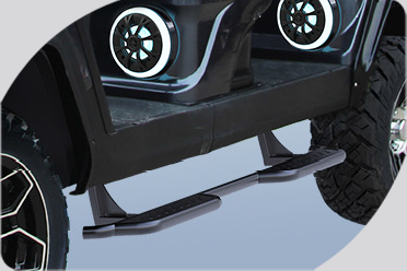 A close up of the side of a golf cart with speakers