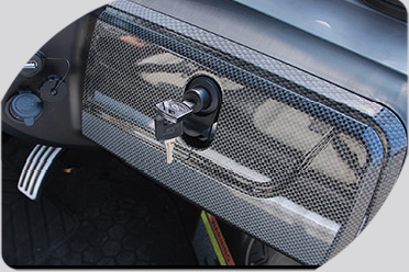 A close up of a car dashboard with a key in it