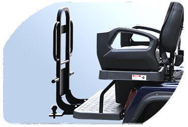 A golf cart with a rear handrail attached to it.