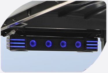 A black speaker with blue lights on a blue background.