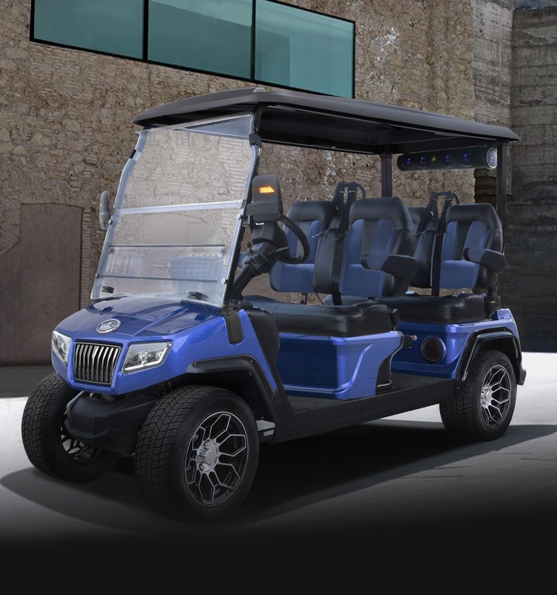 A blue golf cart is parked in front of a building.
