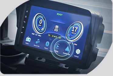 A close up of a car dashboard with a blue screen.