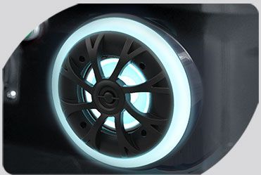 A close up of a wheel with a light on it.