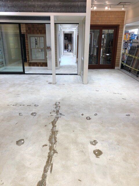 Showroom flooring being repaired