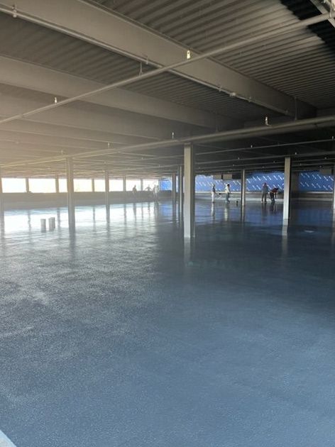 An empty parking garage with a lot of windows