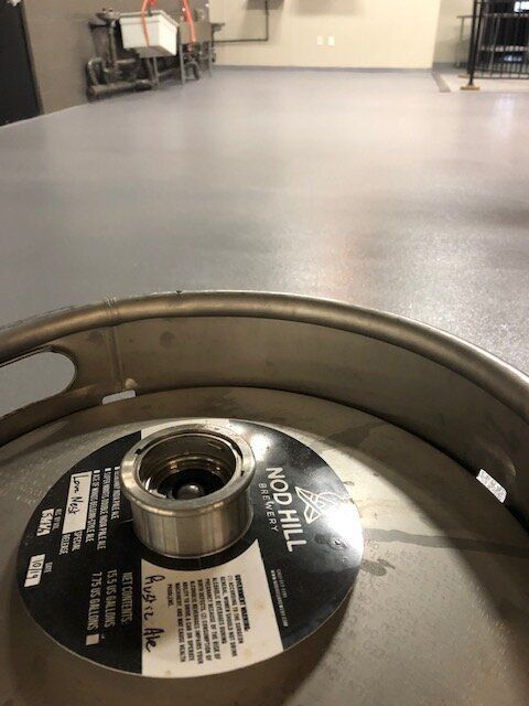 A keg with a label on it that says knoll hill