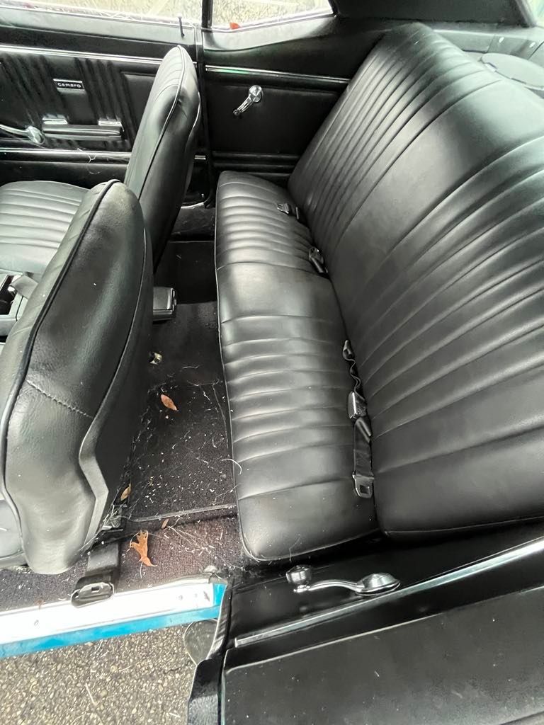 A close up of the back seat of a car.