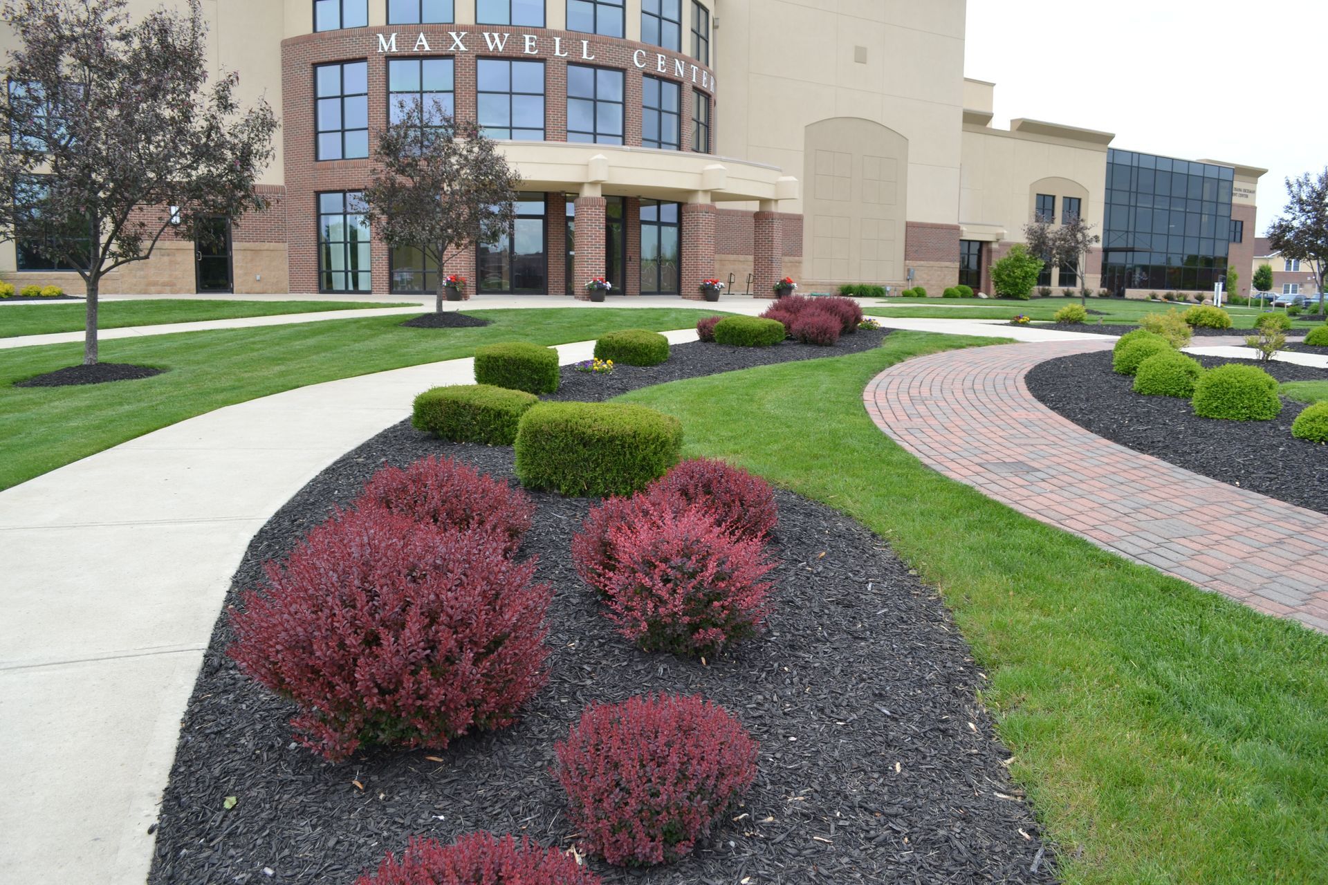 A large building with a walkway leading to it