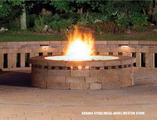 A fire pit with a fire coming out of it