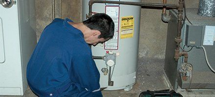 Technician checking Heating system