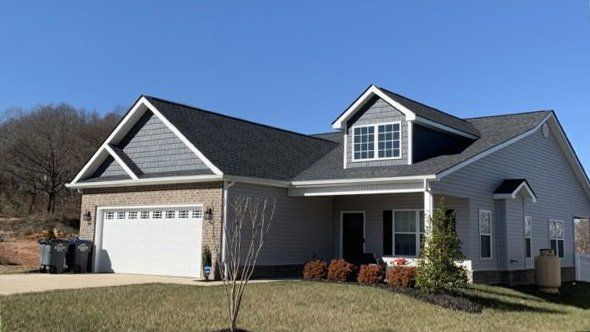 House with cream siding