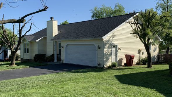 House with yellow siding