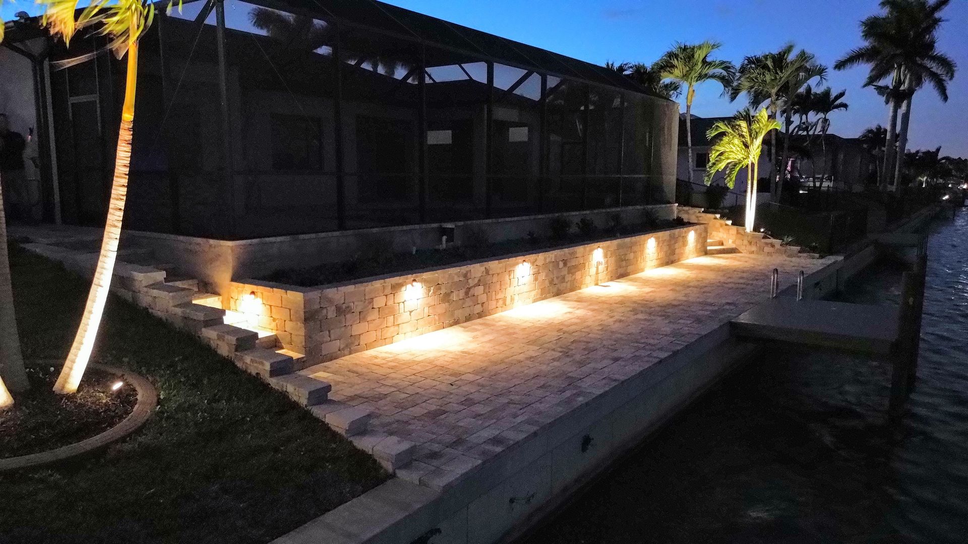 A house with a lot of lights on the side of it