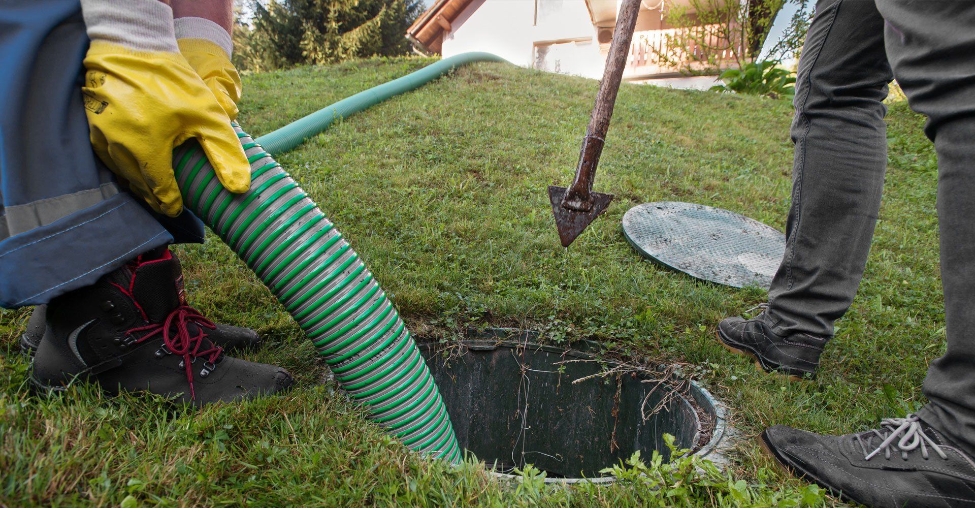 Workers pumping the septic