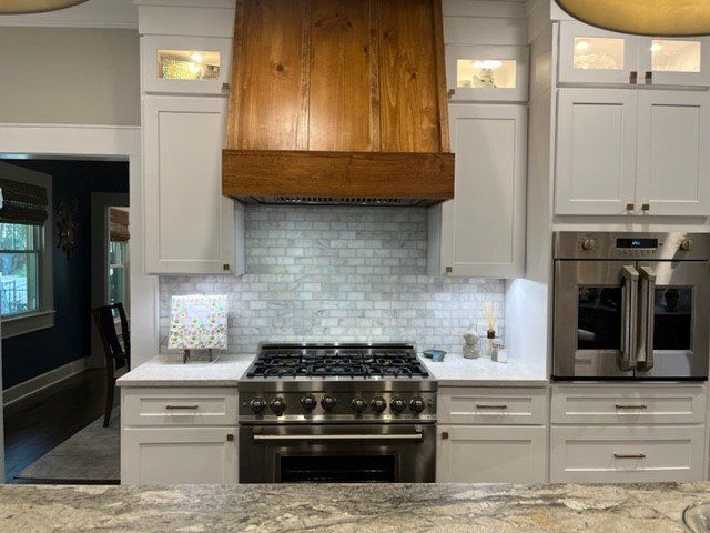 White kitchen cabinets with stove
