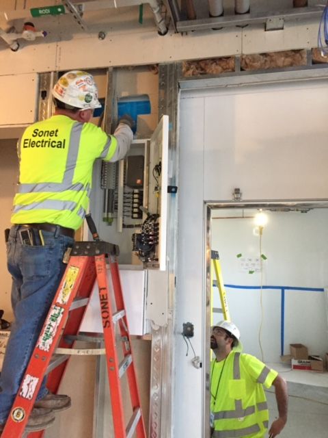 Man working on wiring