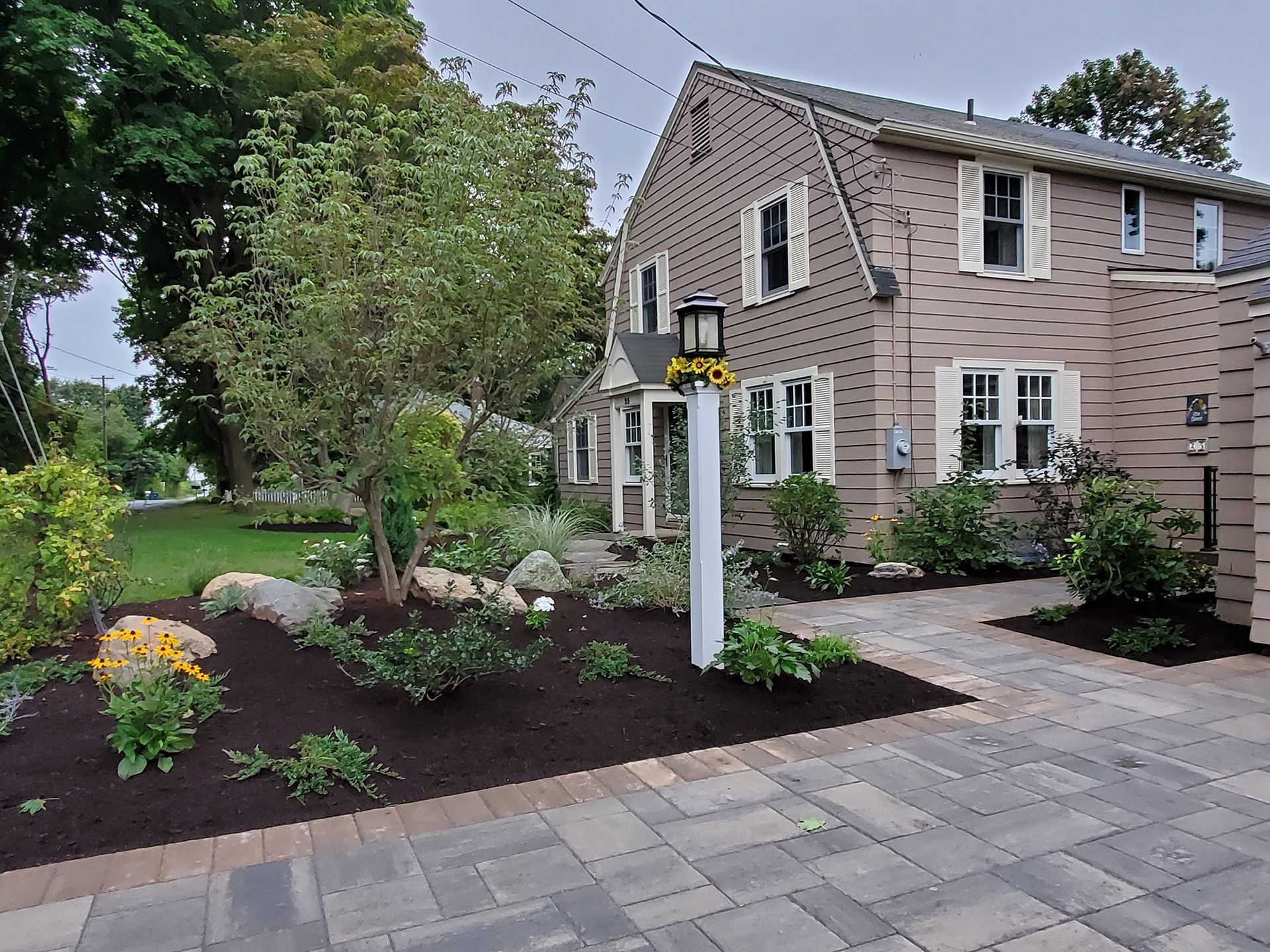 A house with a lantern on the front of it