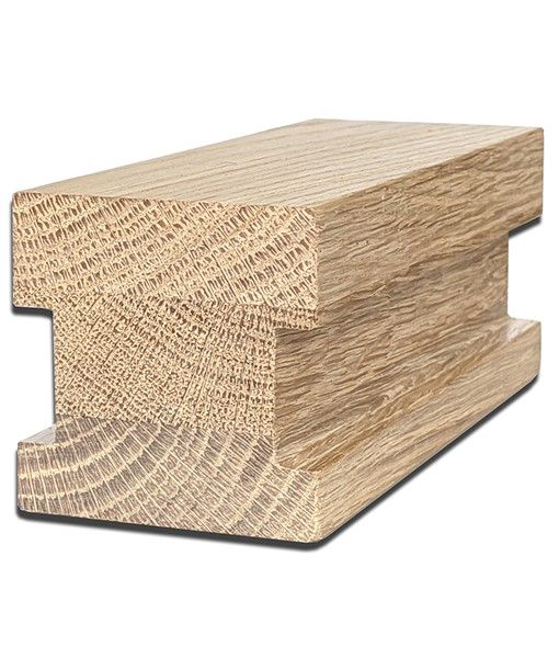 Wooden molding profile, light brown with an H-shape. Grain is visible.
