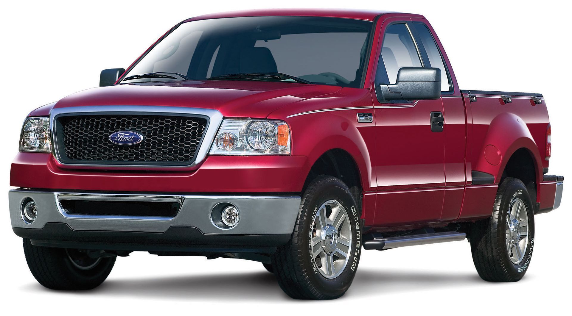 Red pickup truck with chrome grille on a white background