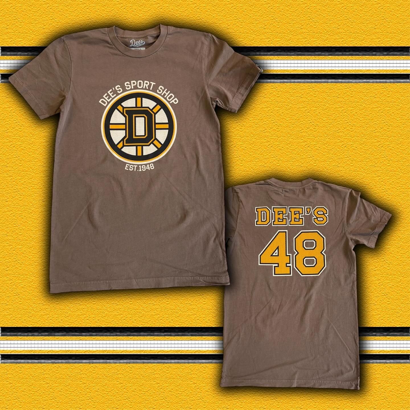 Brown sports T-shirts on yellow background, front and back views with “DEE’S 48” and circular logo.