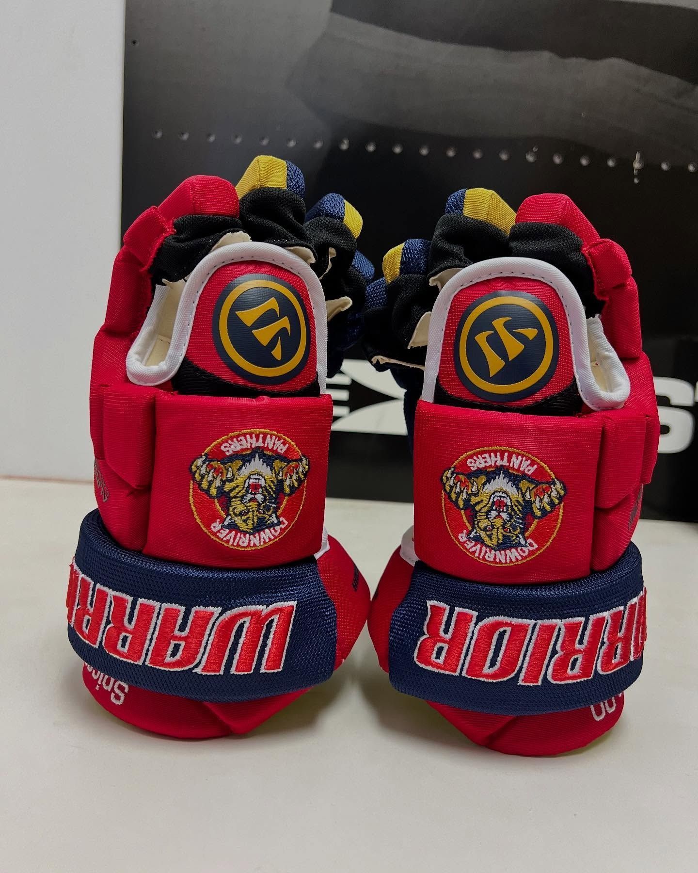Pair of red-and-blue sports sneakers with 
