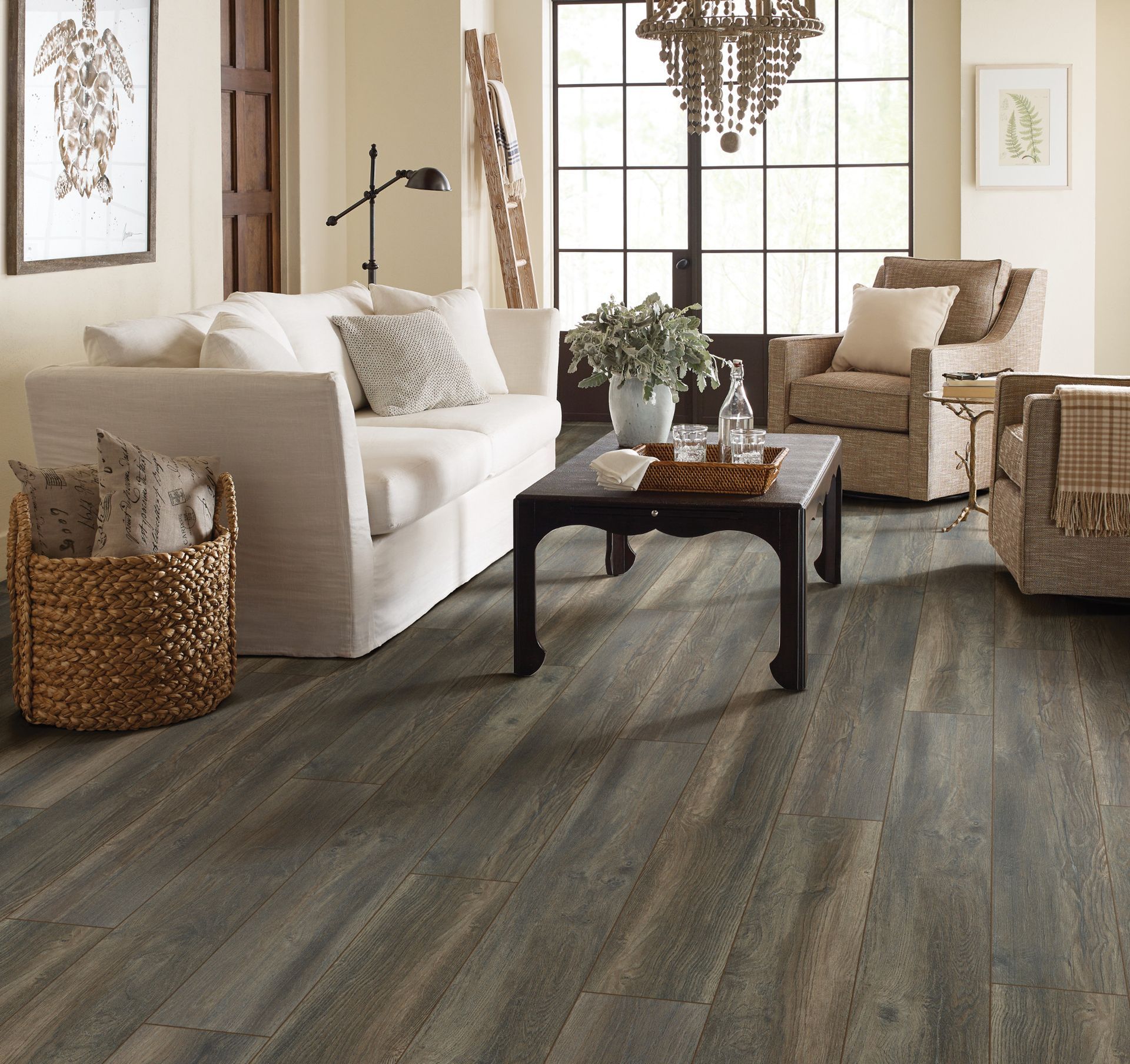 a living room with a couch a chair and a coffee table