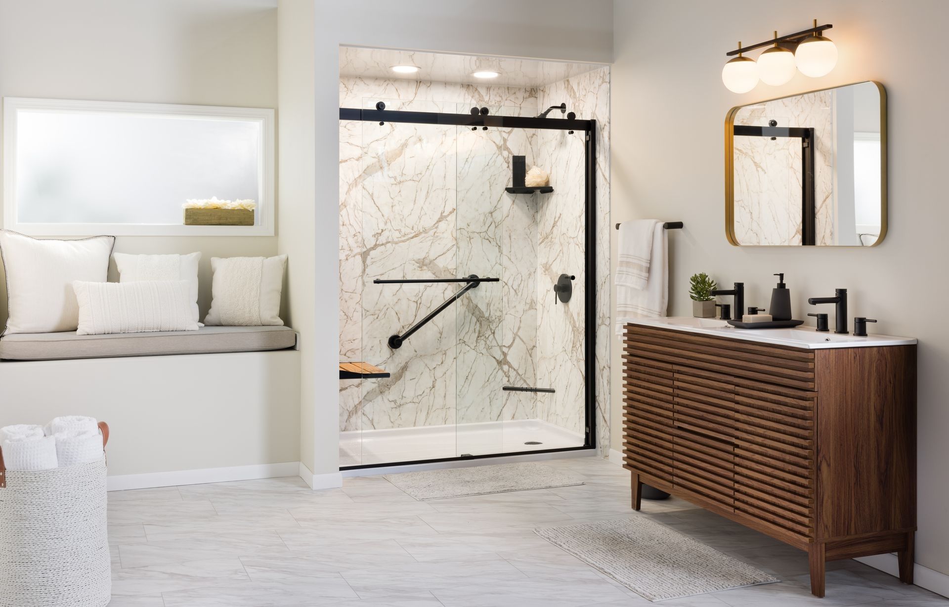 A bathroom with a shower, sink, mirror, and bench.